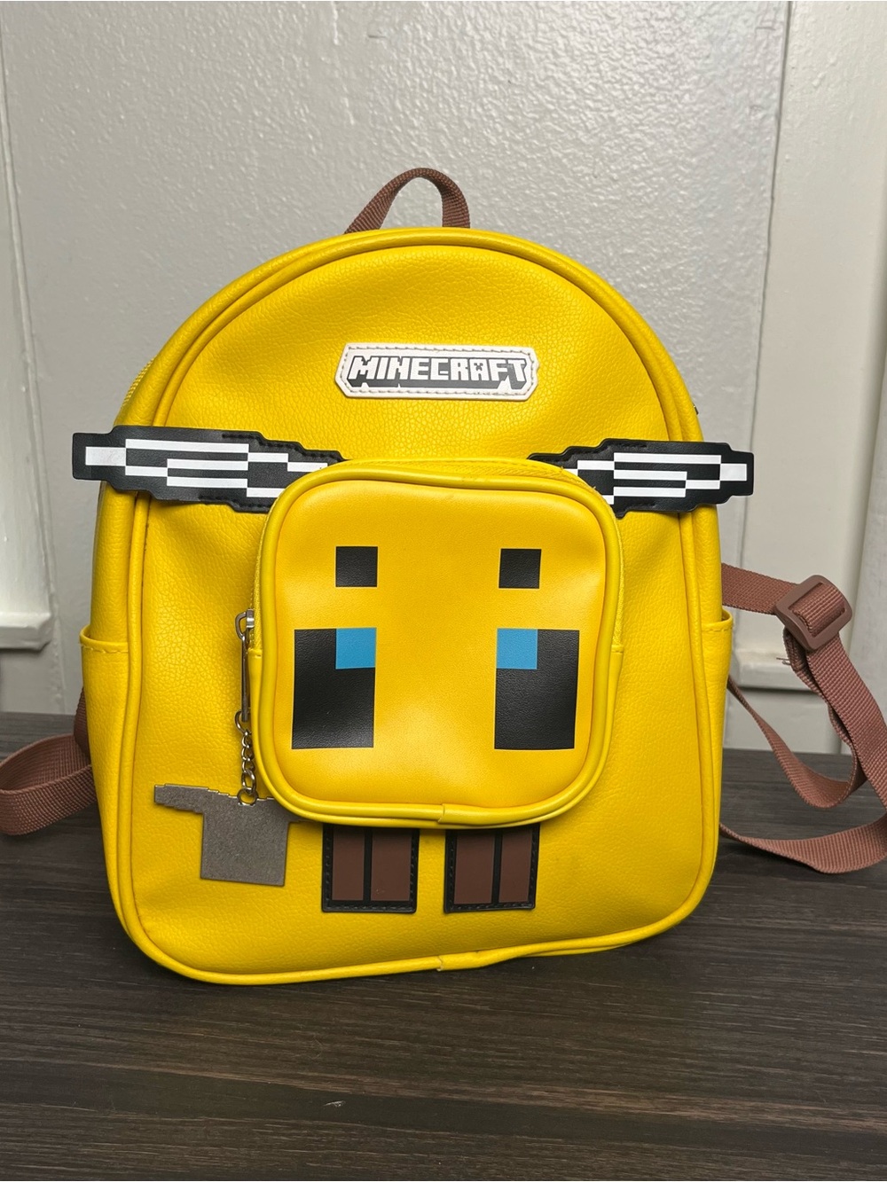 Buzz Into Adventure: Iconic Minecraft Bee Mini Backpack for Gamers & Fans